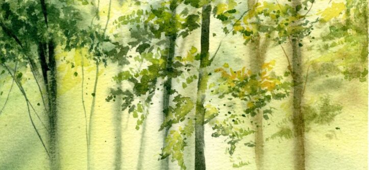 Artist painting watercolors on sustainable bamboo paper with vibrant pigments
