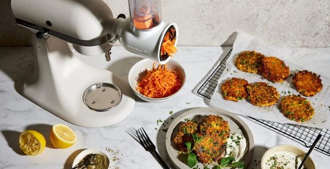 KitchenAid Slicer/Shredder preparing ingredients, showing its speed and convenience.